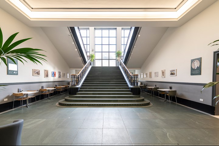 Interior photo of the main staircase to the first floor of the National Library of Scotland.